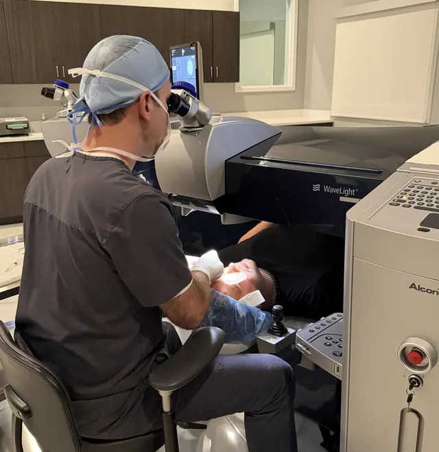 Dr. Hammonds at the WaveLight laser during a procedure
